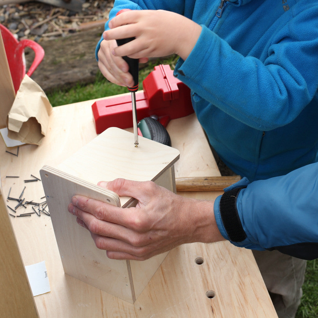 putting together the bird nest box kit